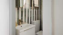 Opposite this bedroom, an additional shower room can be found