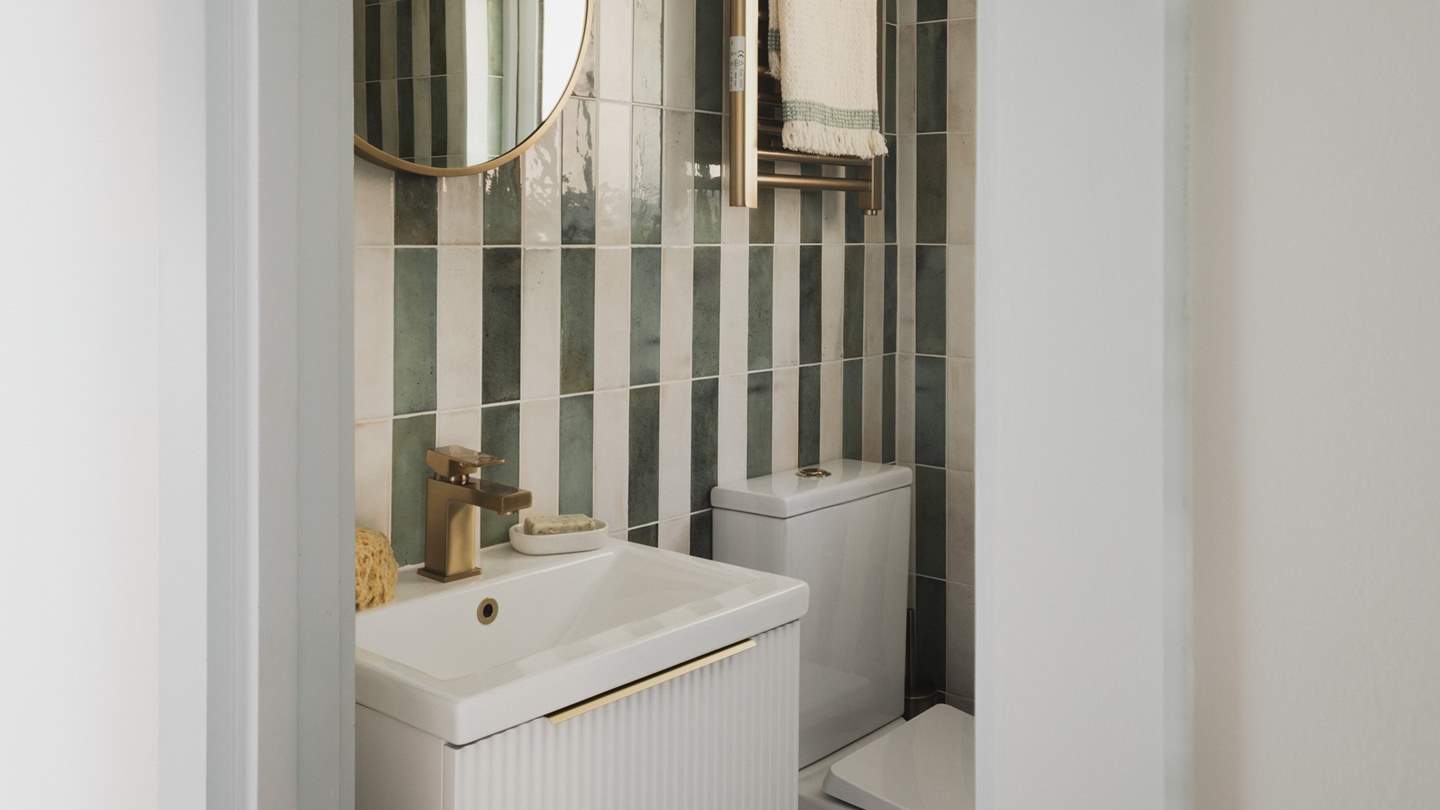 Opposite this bedroom, an additional shower room can be found