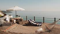 Gently sway in the hammock on the sun-soaked terrace