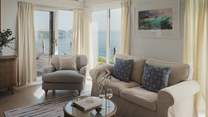 In a spacious, open-plan design, the living area of Brigantine is a picture of coastal perfection
