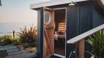  A private sauna awaits, with the addition of an outdoor shower for rejuvenating moments 
