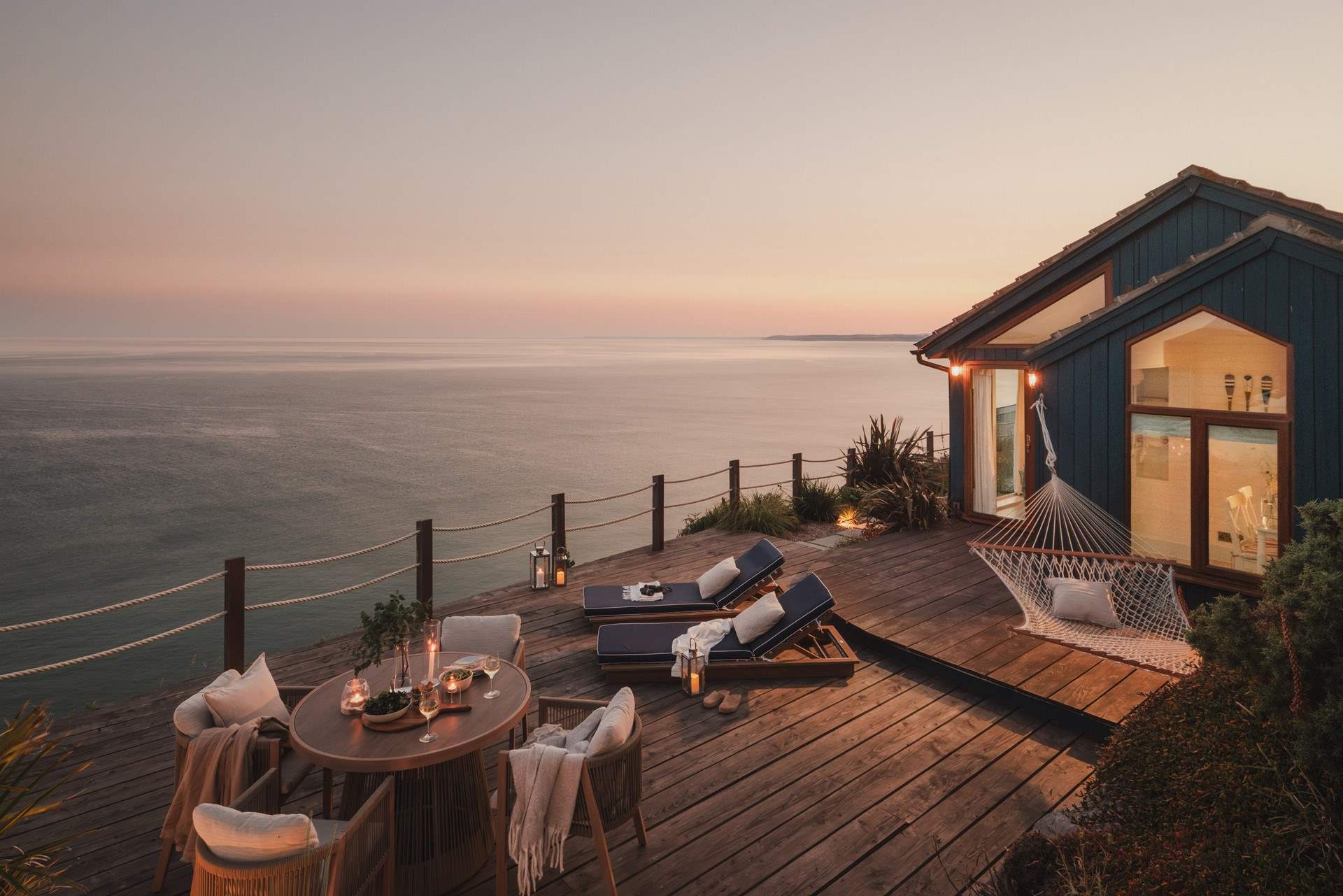 Embrace oceanside reveries for two above the dreamy coastalscapes of Whitsand Bay...