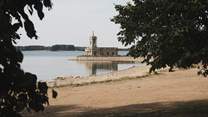 Discover the beauty of Rutland Water, where the iconic Normanton Church provides a picturesque backdrop