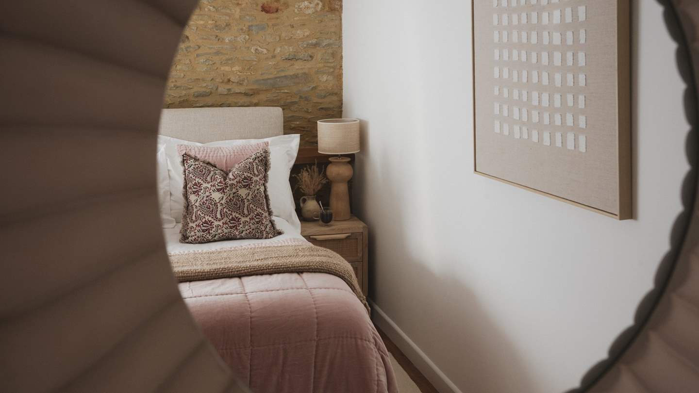 Built-in wardrobes offer plenty of space for storing belongings