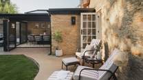 A reclining bistro set offers a space for slow morning coffees 