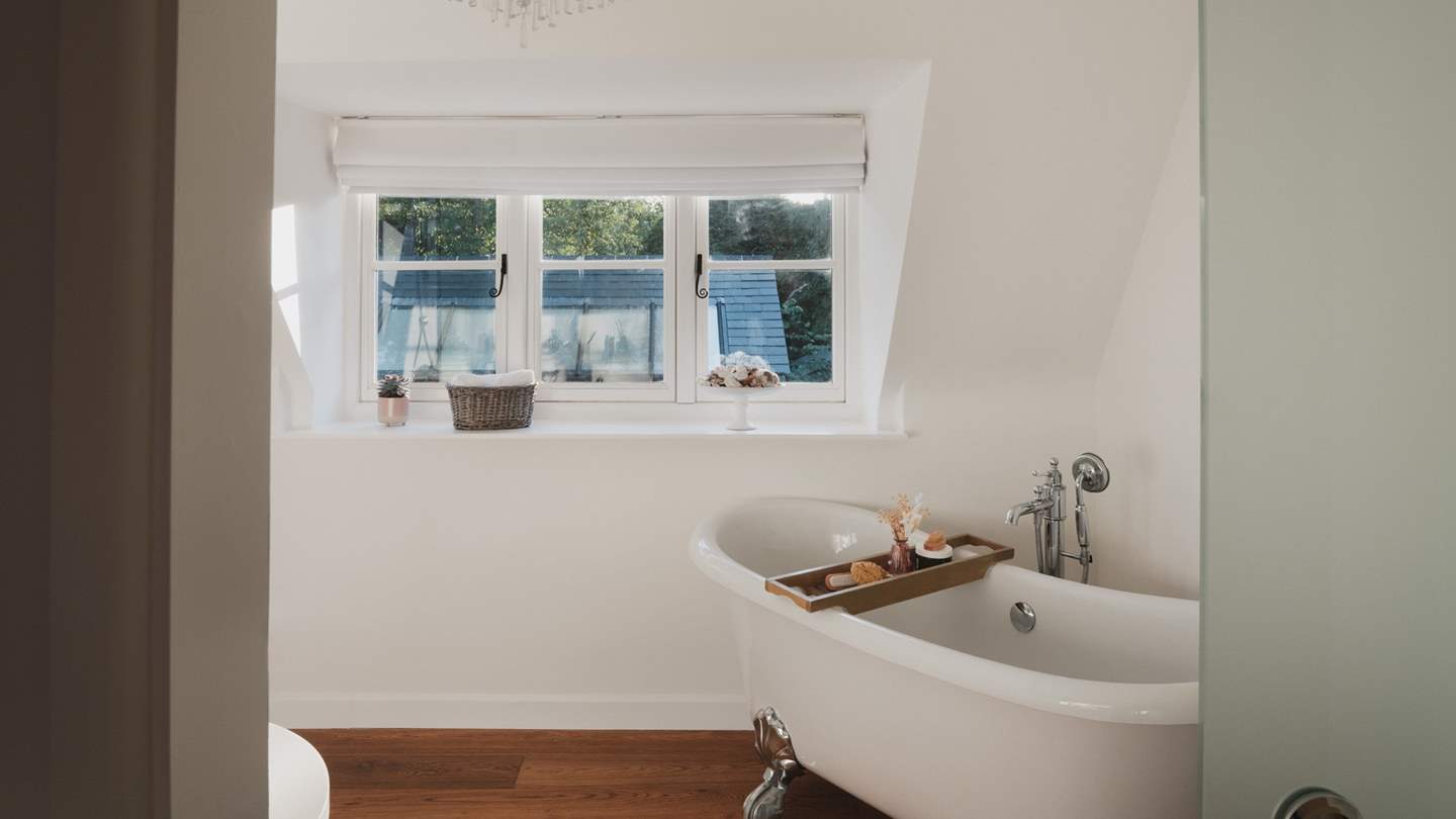 The family bathroom is a haven for relaxing self-care rituals