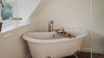 The slipper bathtub beckons for bubble-topped soaks
