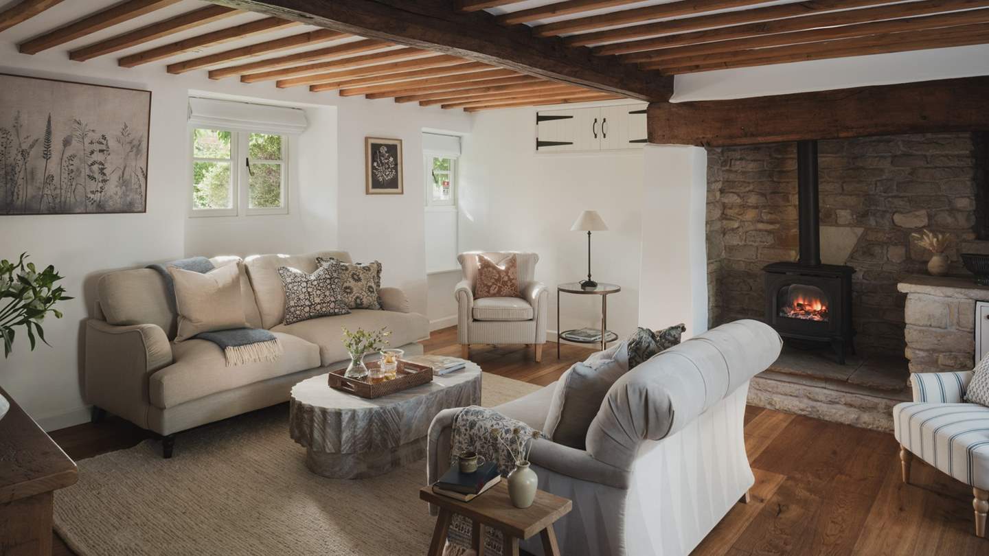 A symphony of comforting shades, the living area welcomes effortless relaxation