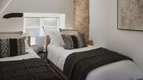 Built-in wardrobes offer ample space for stowing away belongings