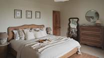 The dreamiest space to reside, the master bedroom is adorned in a palette of soothing neutral shades and organic textures 