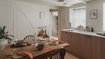 This quaint space offers an array of appliances for culinary crafting in your home from home