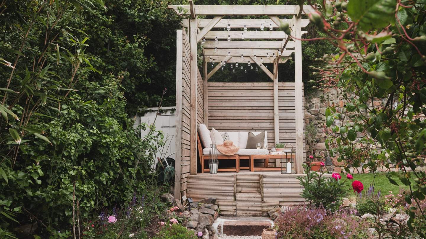 Step outside and follow the quaint steps to uncover an enchanting cottage garden