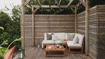 Life’s most serene moments await beneath the decked pergola