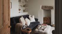 Settle in for the evening in front of the Smart TV on the cosy slate Loaf sofa