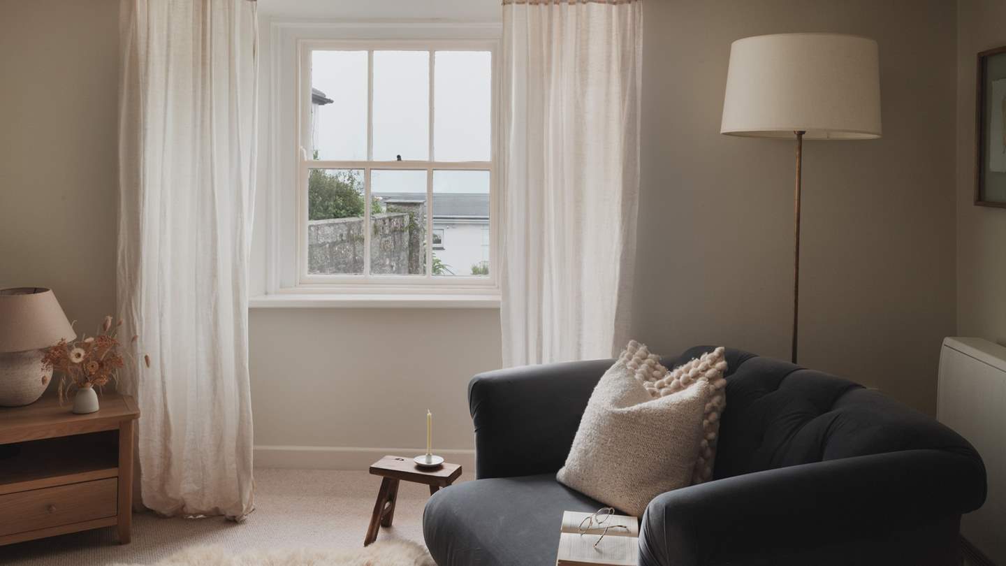 The magic of slow living, accompanied by inspiring glimpses of ocean scenes beyond the windowpanes
