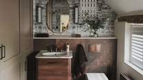 An additional bathroom can be found in the downstairs cloakroom 
