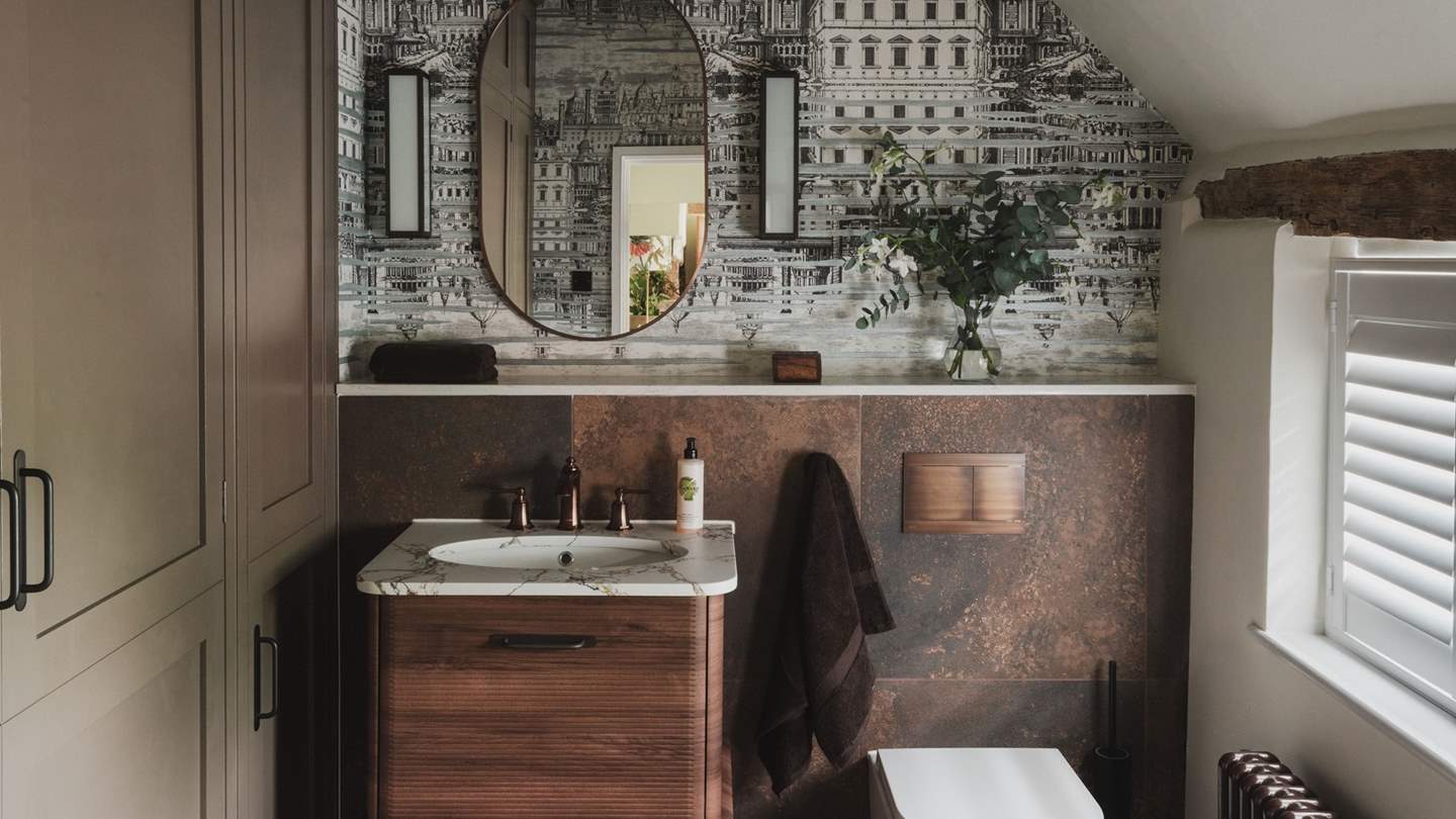 An additional bathroom can be found in the downstairs cloakroom 