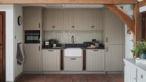 In addition to a cosy living space, you'll find a well-equipped kitchen with a Belfast sink resting centre