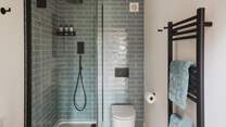 There is also a contemporary bathroom for post-dip showers