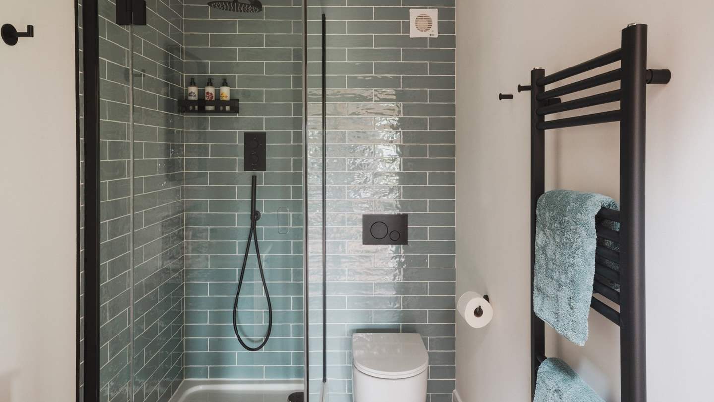 There is also a contemporary bathroom for post-dip showers