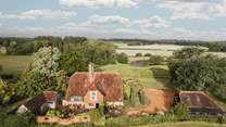 Set amongst verdant Sussex countryside, Demeter's tended gardens blend with rolling rural landscapes to paint a timeless portrait of quintessential country charm