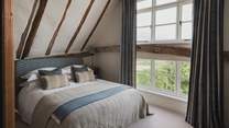 Meanwhile, a third bedroom has a king size bed and resides in one of the oldest parts of the house