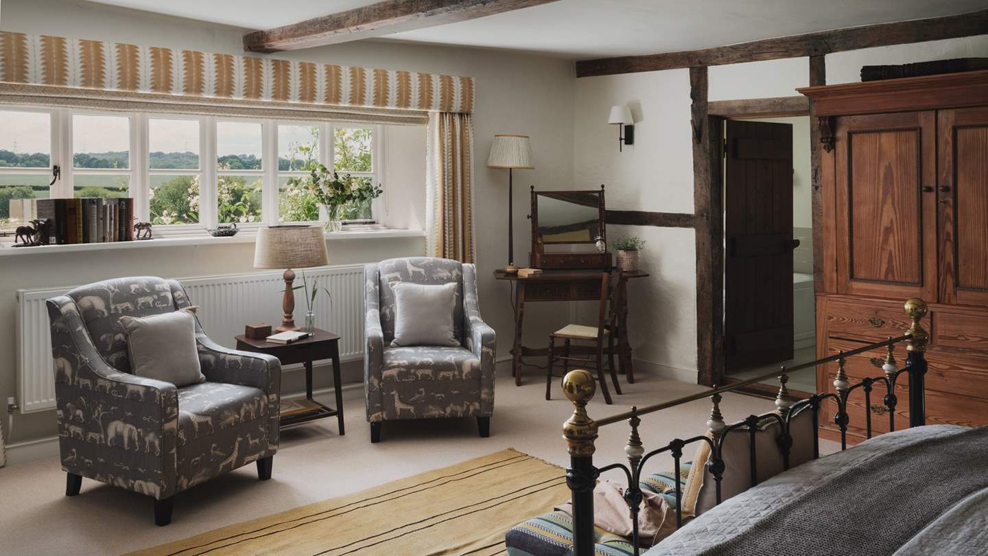 A beautiful backdrop for lingering lie-ins, with stunning views views over the gardens, lake, and Sussex countryside 