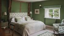 Gentle greens decorate the walls in this historic space
