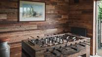 Here, a bar, table tennis, table football, darts, and Smart TV call to all generations