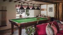 A full-size snooker table promises hours of spirited play