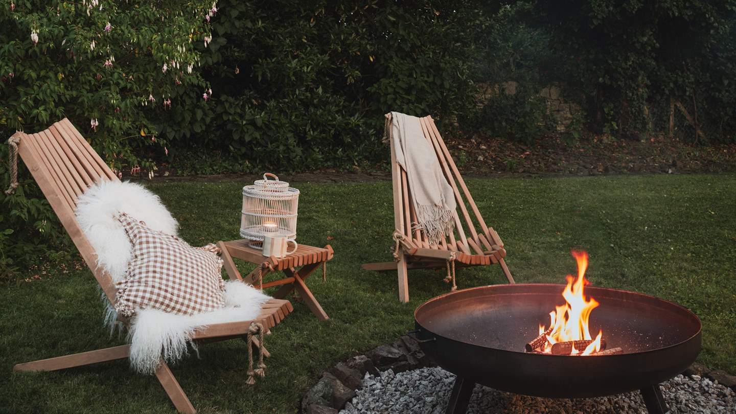 Settle into the Adirondack chairs with a cosy blanket and soaking up the warmth of the glowing fire pit