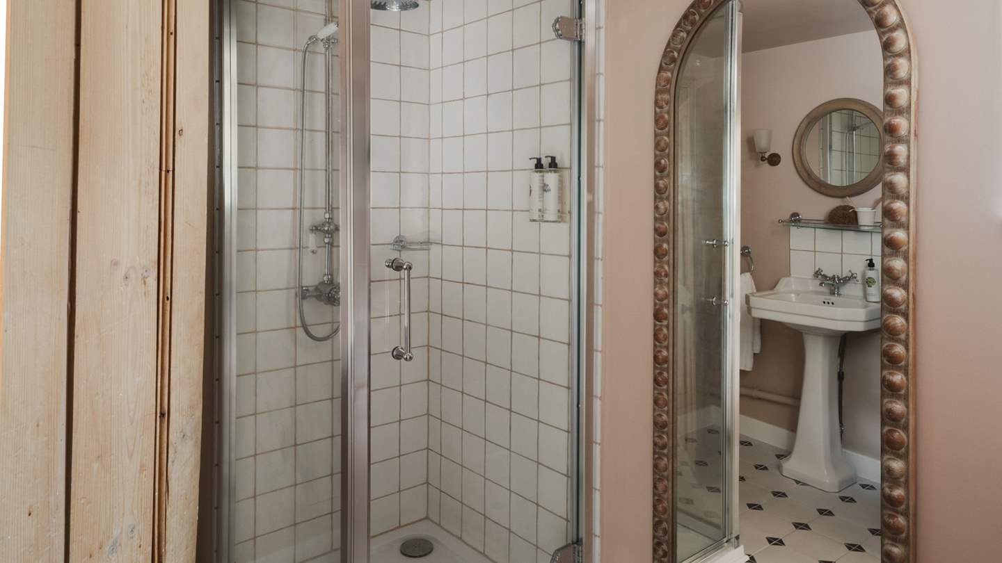 On the first floor, you’ll find the family shower room, with heated towel rail to keep towels fluffy and warm