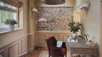 At the far side of the room, a charming writing desk awaits, should you need to catch up on an email or two 