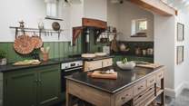 Uncover bespoke cabinetry in forest shades