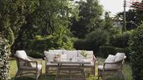 Relish moments of calm beneath blue skies from the inviting lounge set