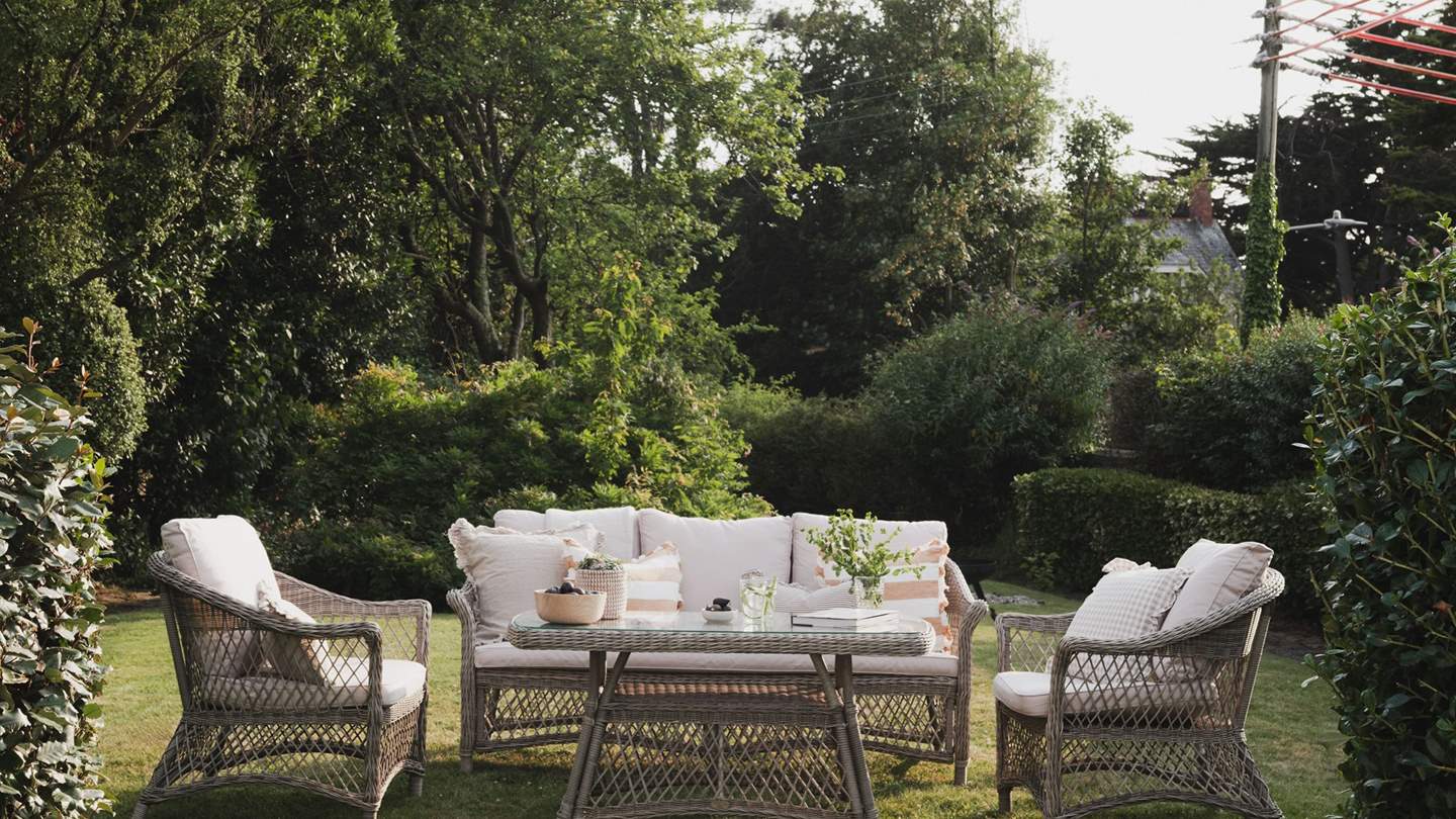 Relish moments of calm beneath blue skies from the inviting lounge set