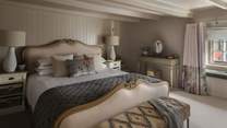 The dreamy master bedroom is a calming space for lingering lie-ins
