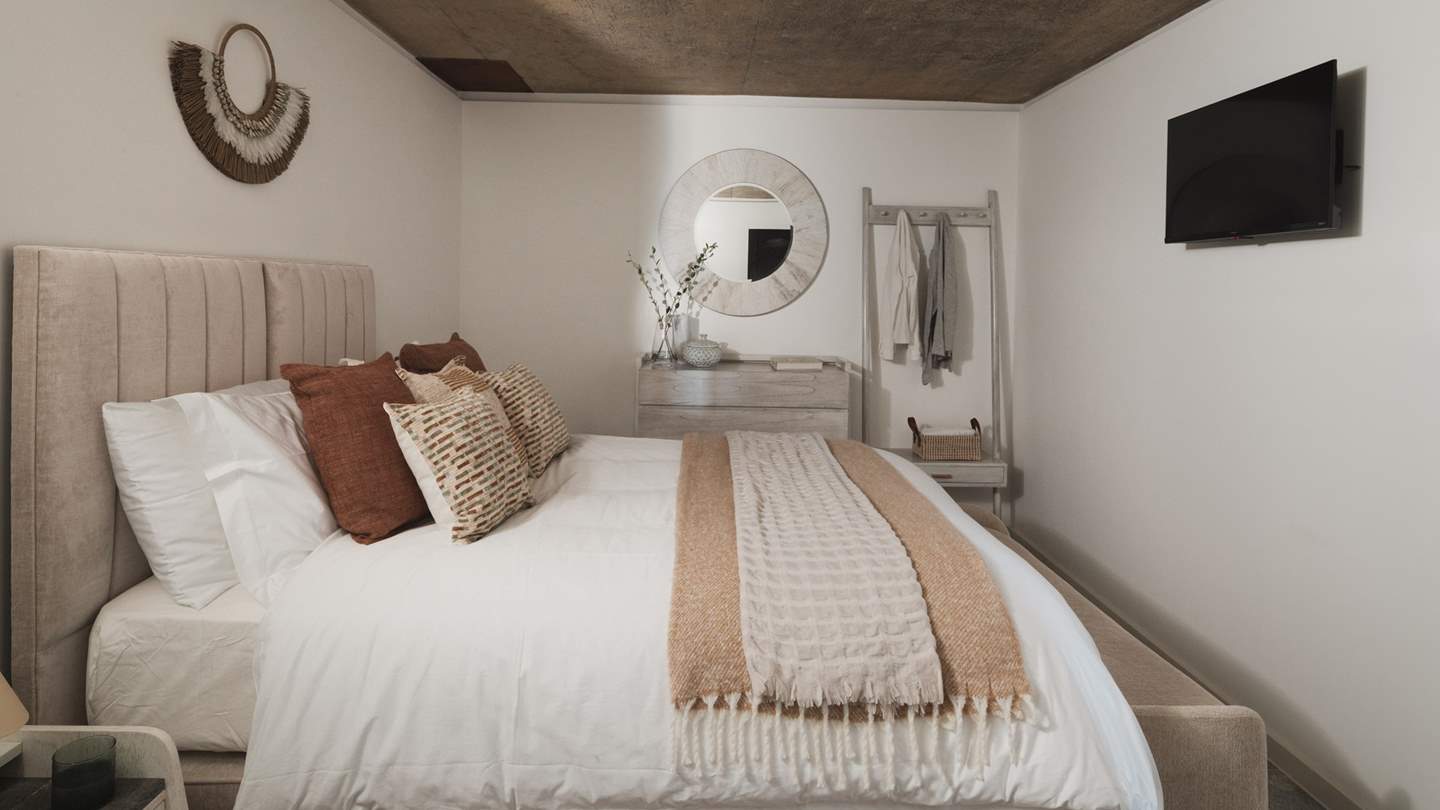 The second bedroom has a comfortable king size bed that can be transformed into twins upon requirement