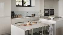 Craft delectable feasts around the kitchen island whilst enjoying the backdrop of ever-changing skies