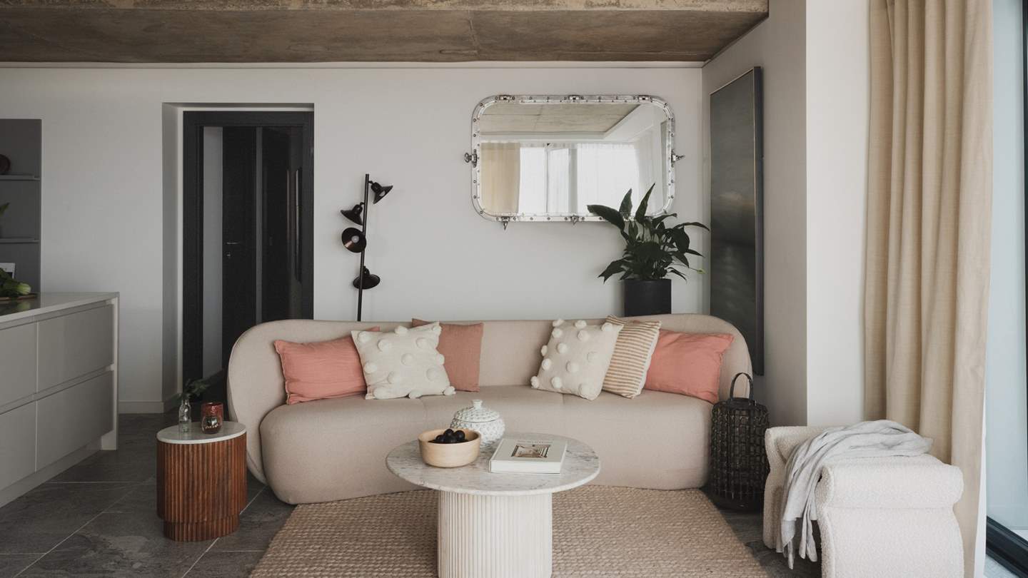 Perfect for moments of quietude gazing at the views, the light-filled open plan living room is a dream