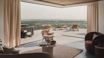 Uncover luxurious living with floor-to-ceiling windows promising soul-stirring views...