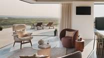 Warmed by underfloor heating, it features floor-to-ceiling glass corner windows that reveal spectacular panoramas across the countryside towards Braunton Burrows