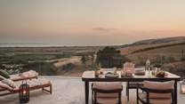 Dine beneath dusky skies until twilight hour...