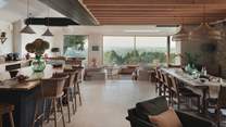 Enjoy sublime countryside views from the open-plan living and dining space