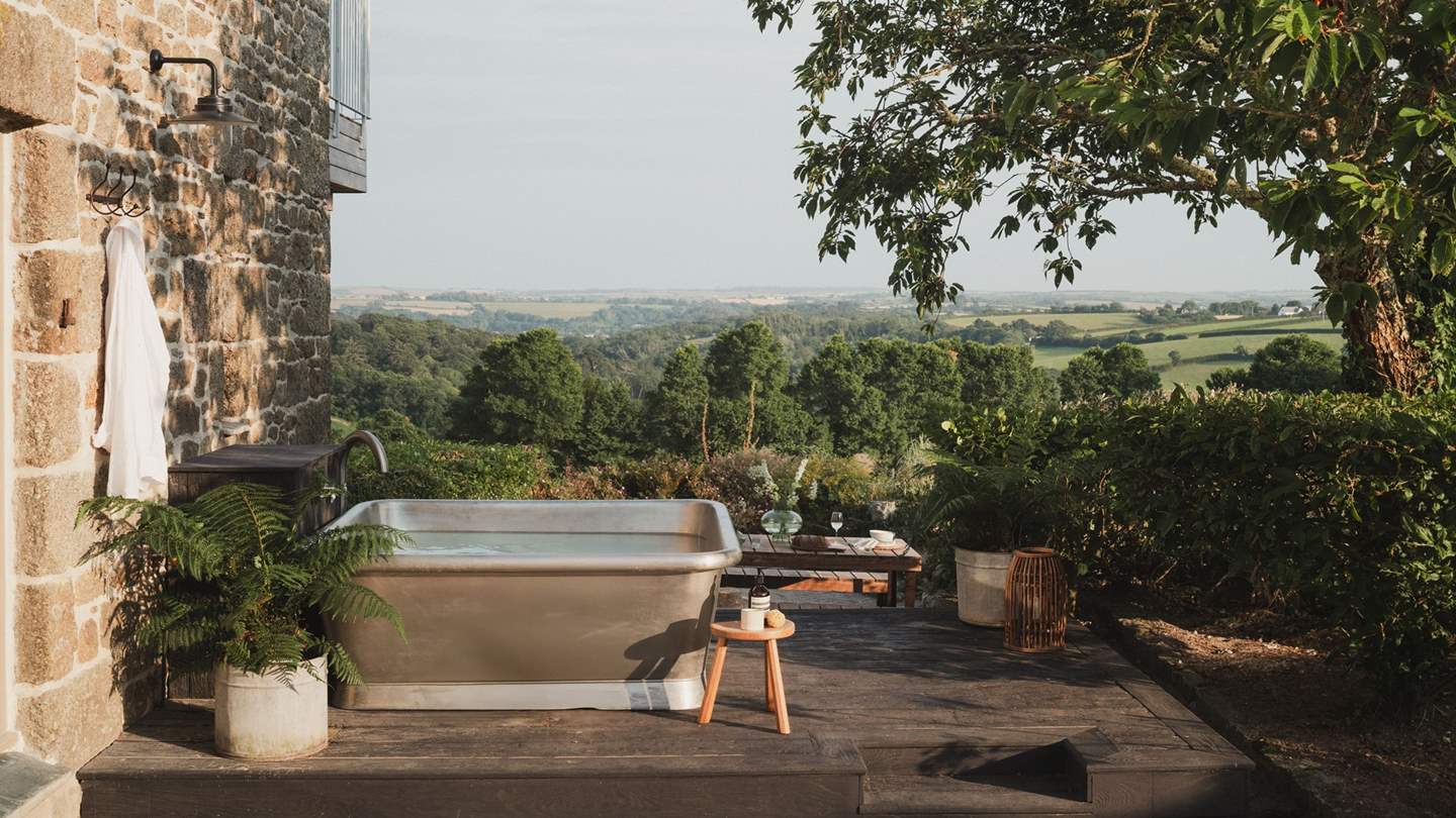 Promising utter contentment, a William Holland outside bath takes pride of place on the terrace 