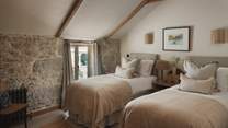 The third bedroom is just perfect for children or friends, with a twin or king zip-and-link bed 
