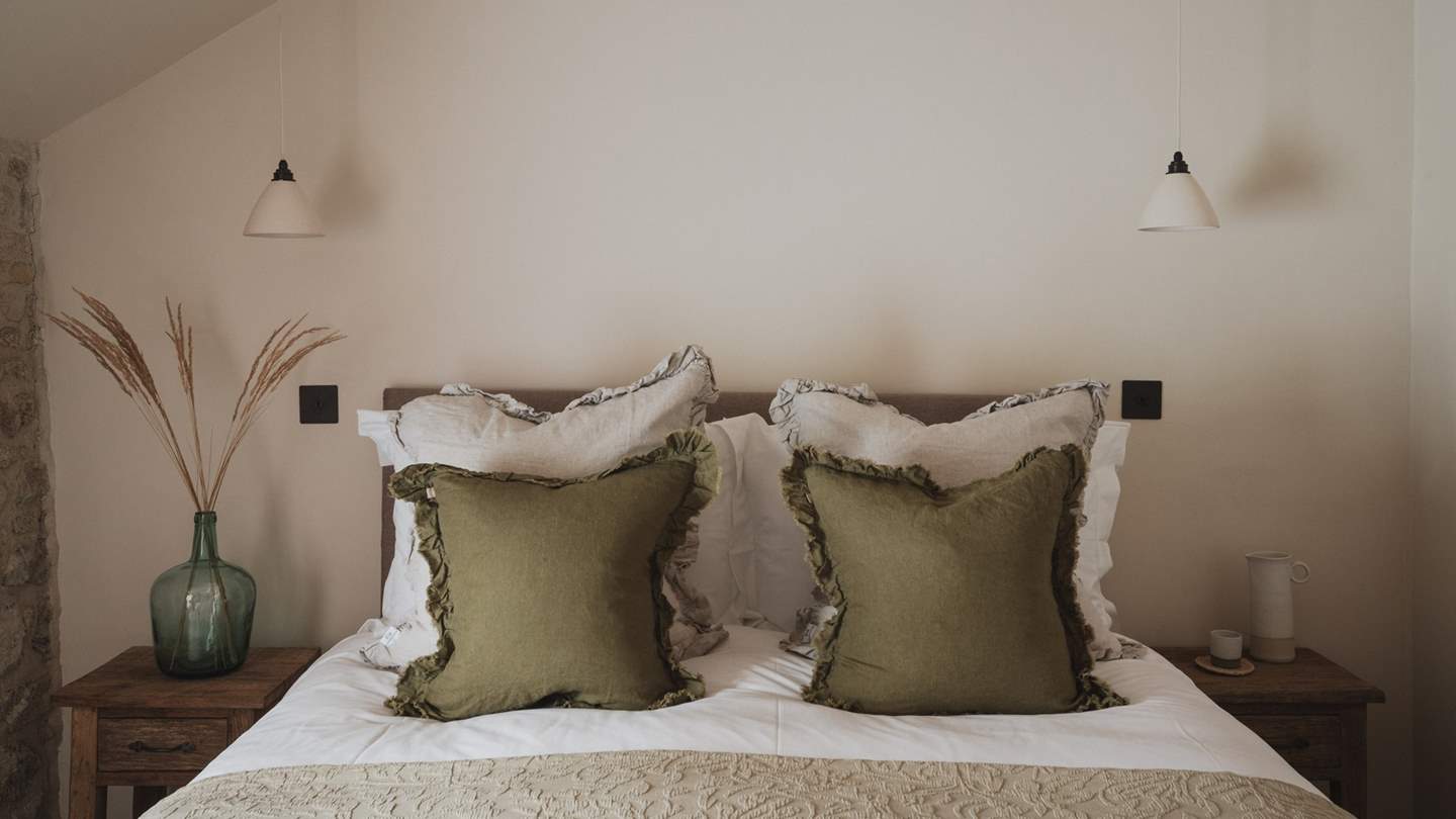 With a cosy king size bed in organic inflections 