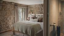 Bedroom five features a sumptuous king size bed