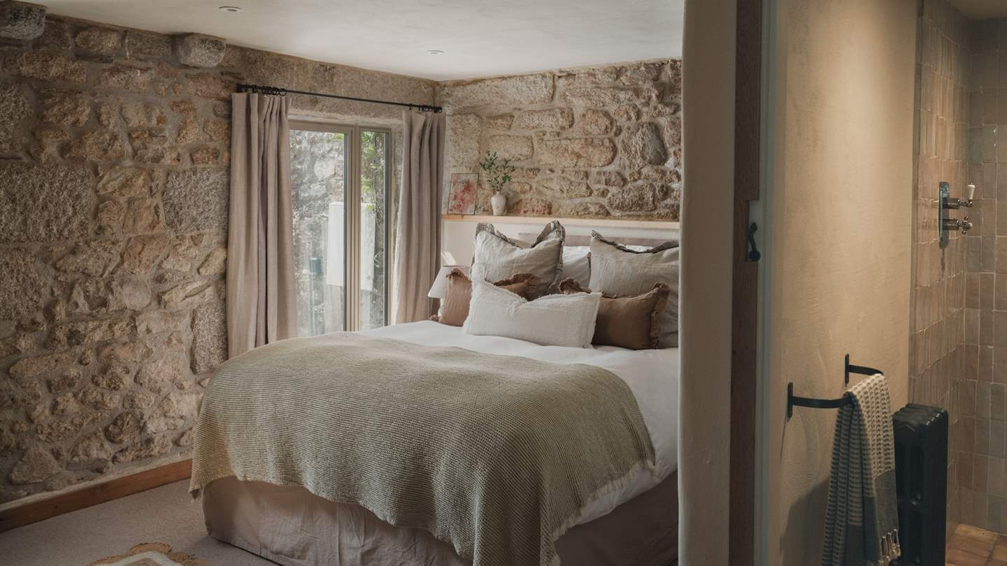 Bedroom five features a sumptuous king size bed