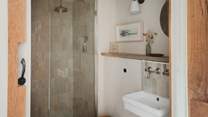 Enjoy rainfall moments in the ensuite shower room